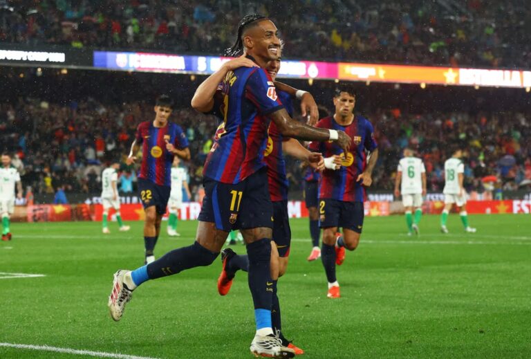 Barcelona hit Racing for seven as Raphinha scores a hat-trick