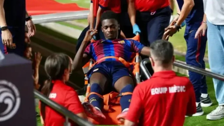 Bisiwu stretchered off as initial assessment rules out a fracture